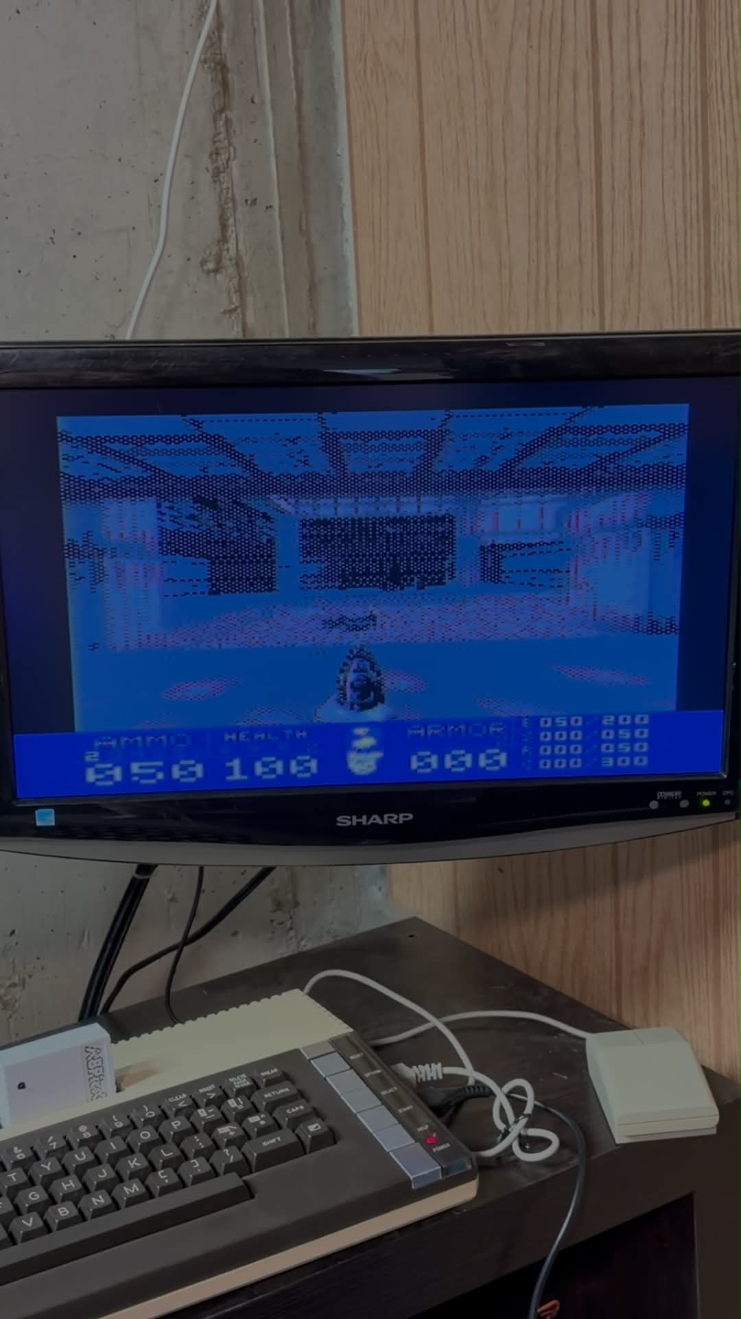 Doom running on a monitor connected to a stock Atari 800XL